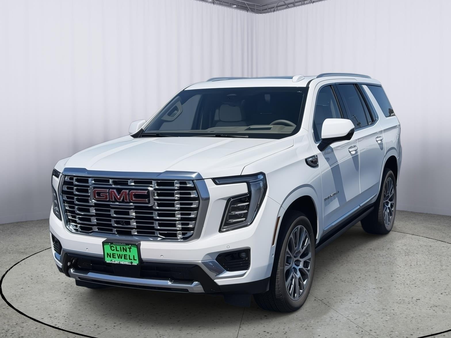 2026 GMC Yukon Denali in Summit White — front three-quarter view