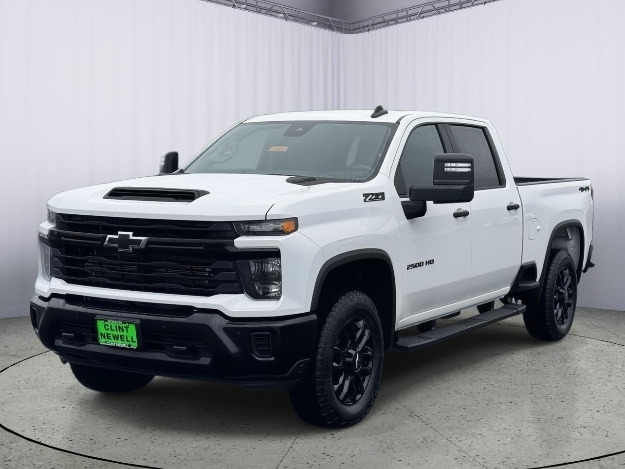 2026 Chevrolet Silverado 2500 HD Custom in Summit White — front three-quarter view