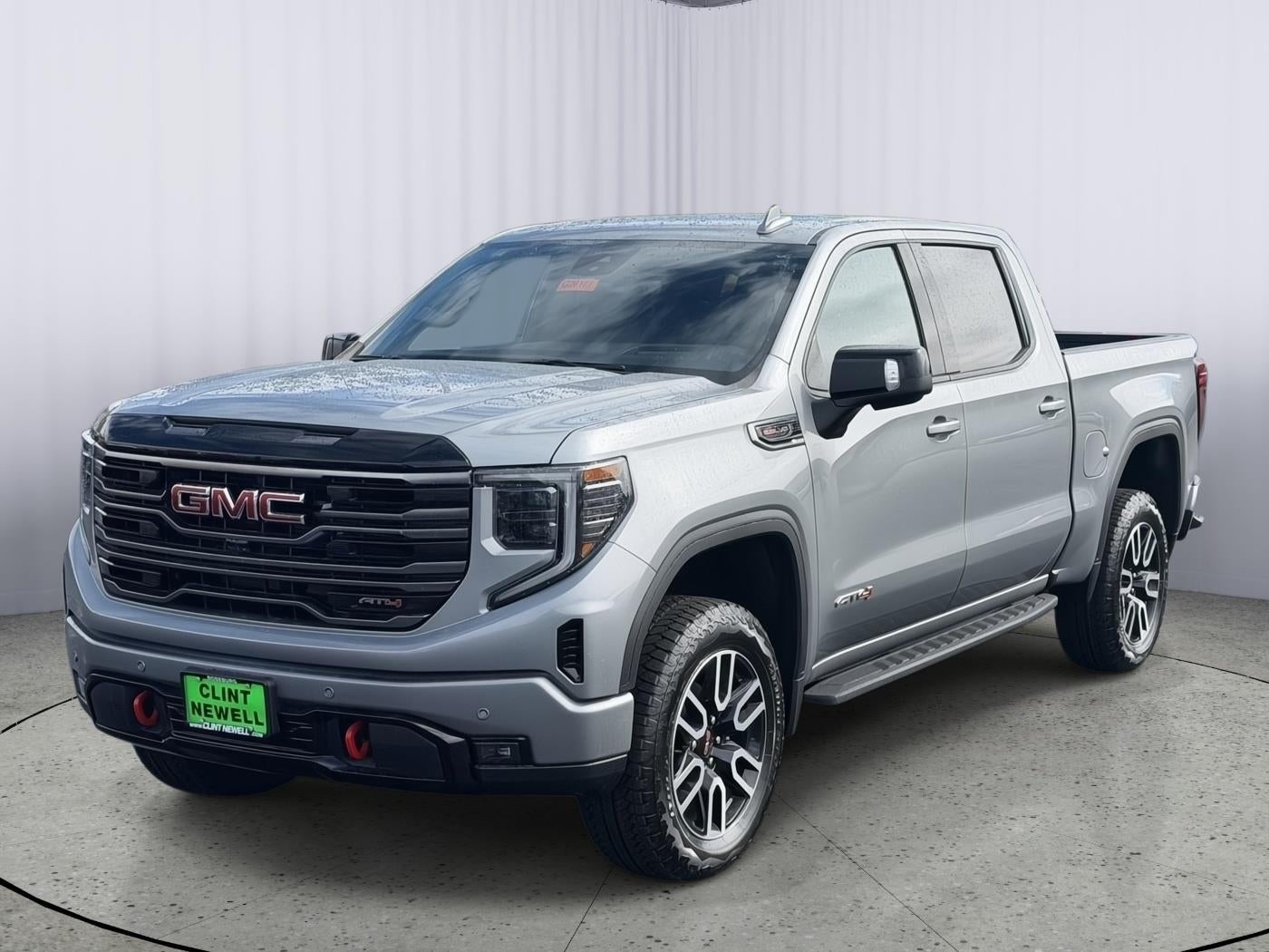 2026 GMC Sierra 1500 AT4 in Sterling Metallic — front three-quarter view