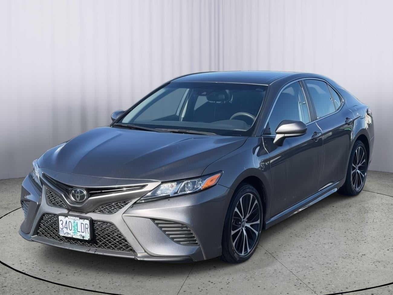 2018 Toyota Camry LE in None — front three-quarter view